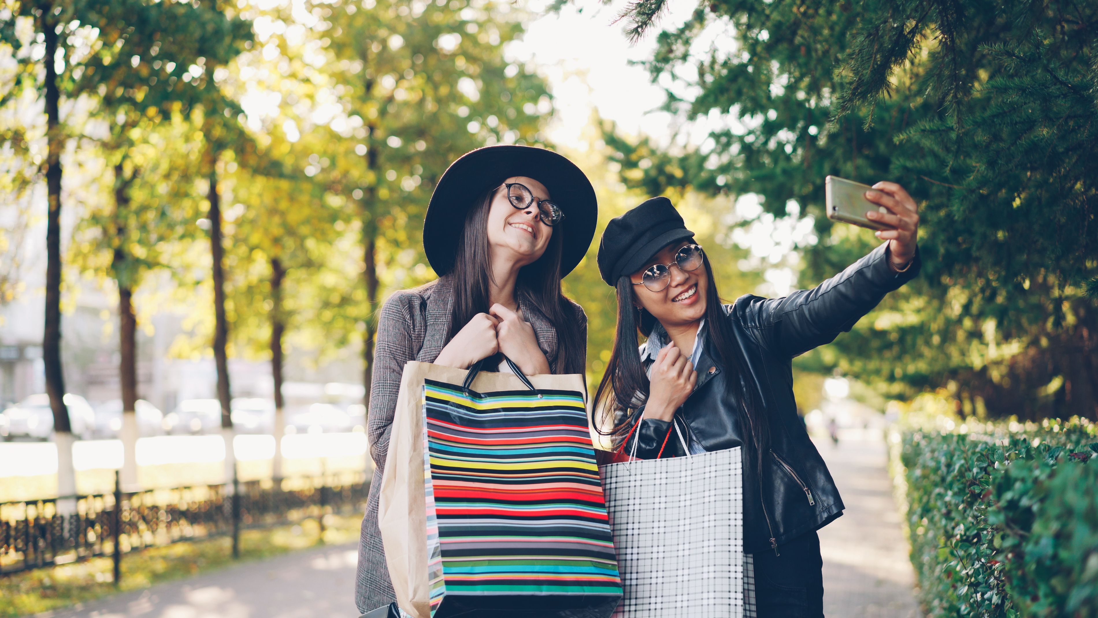 Two Women Taking Selfie During Outdoor Shopping Spree