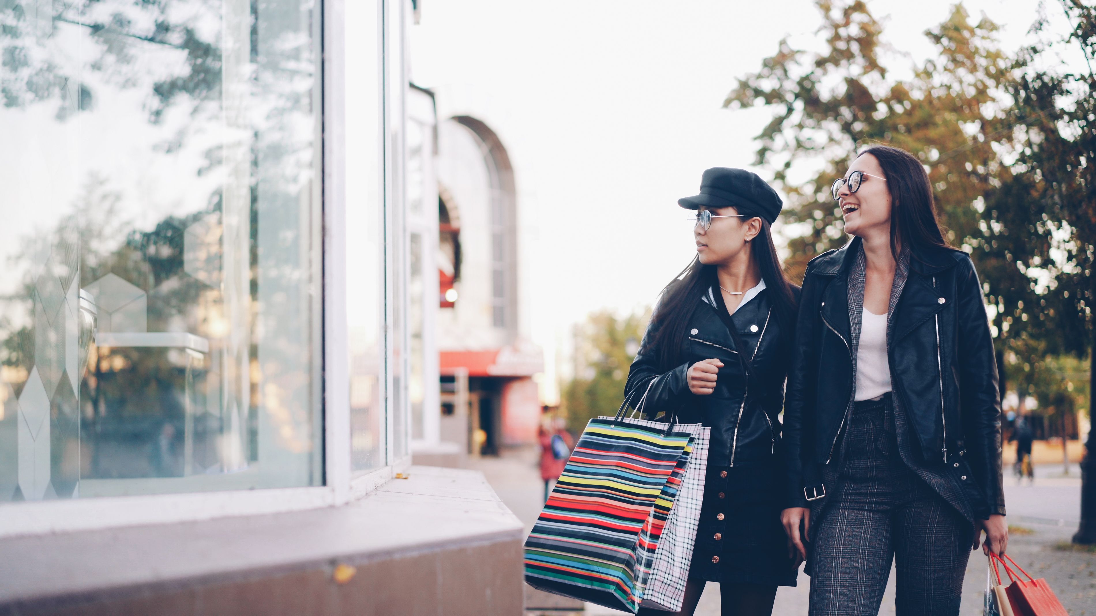 Women Shopping in Urban Setting During Daytime