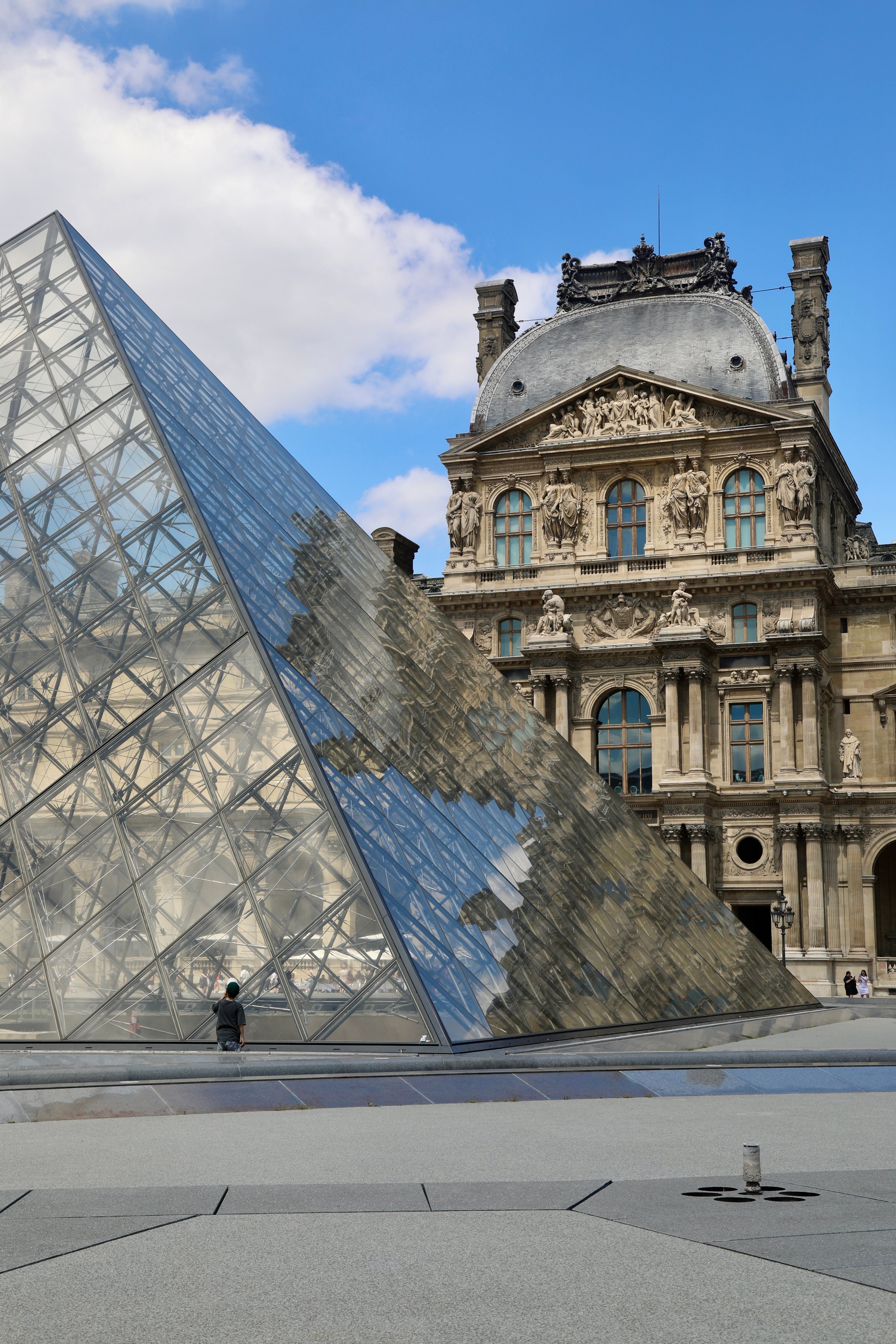 Louvre Pyramid and Historic Building in Paris · Free Stock Photo