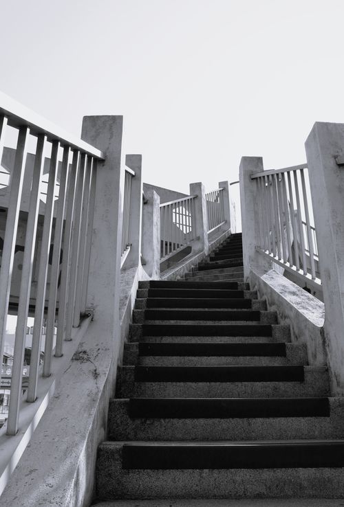 Free A monochrome view of concrete stairs ascending with strong architectural lines, taken in Taiwan. Stock Photo