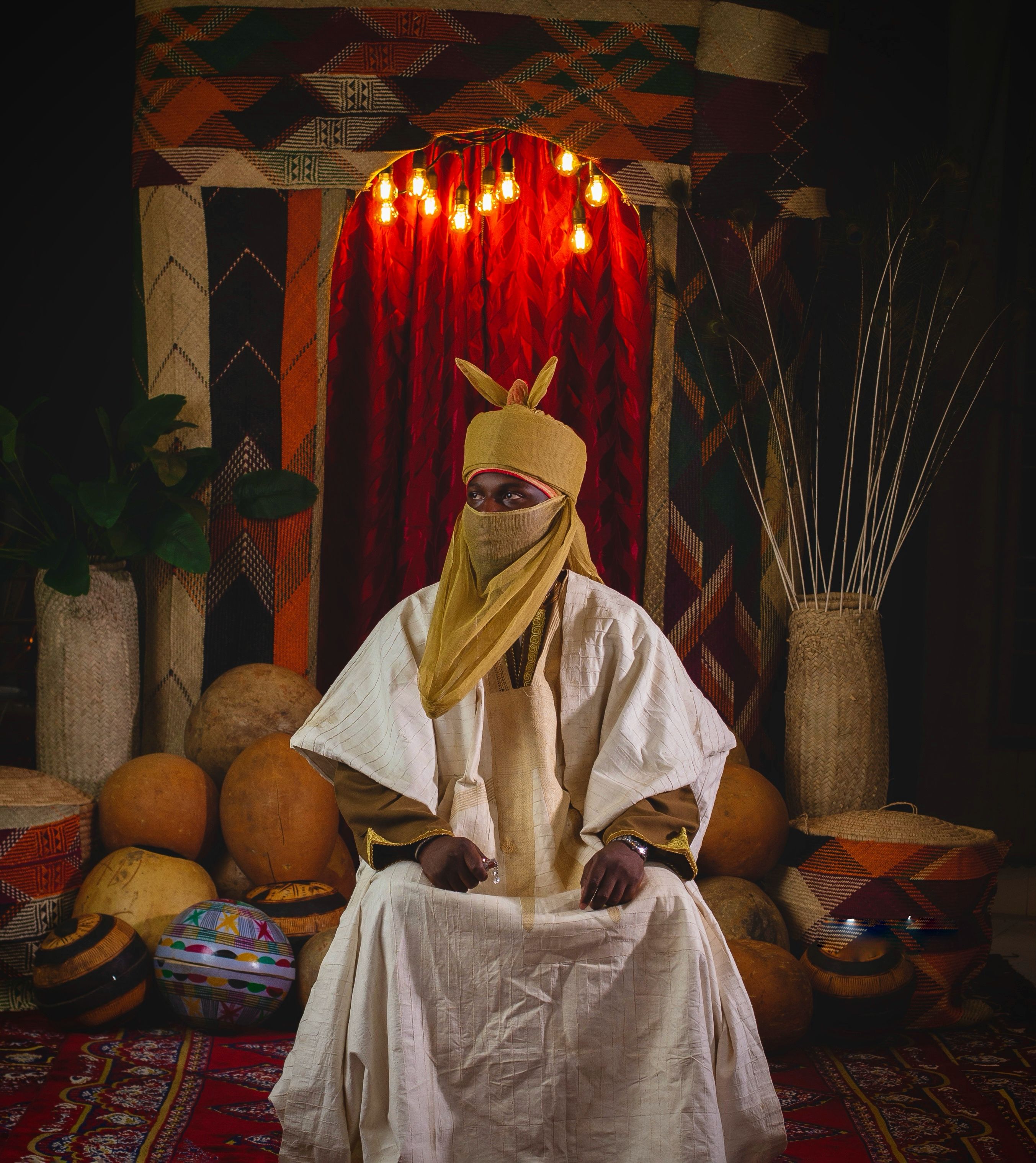 Traditional Hausa Attire in Rich Cultural Setting · Free Stock Photo