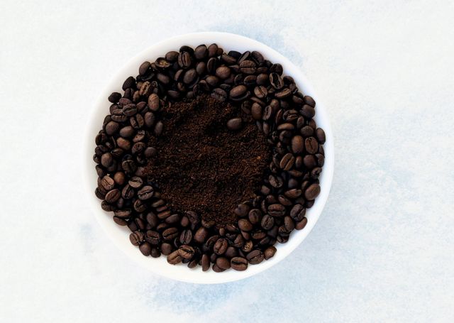 Coffee beans and grounds in a white bowl — photo by Nataliia Filipova on Pexels
