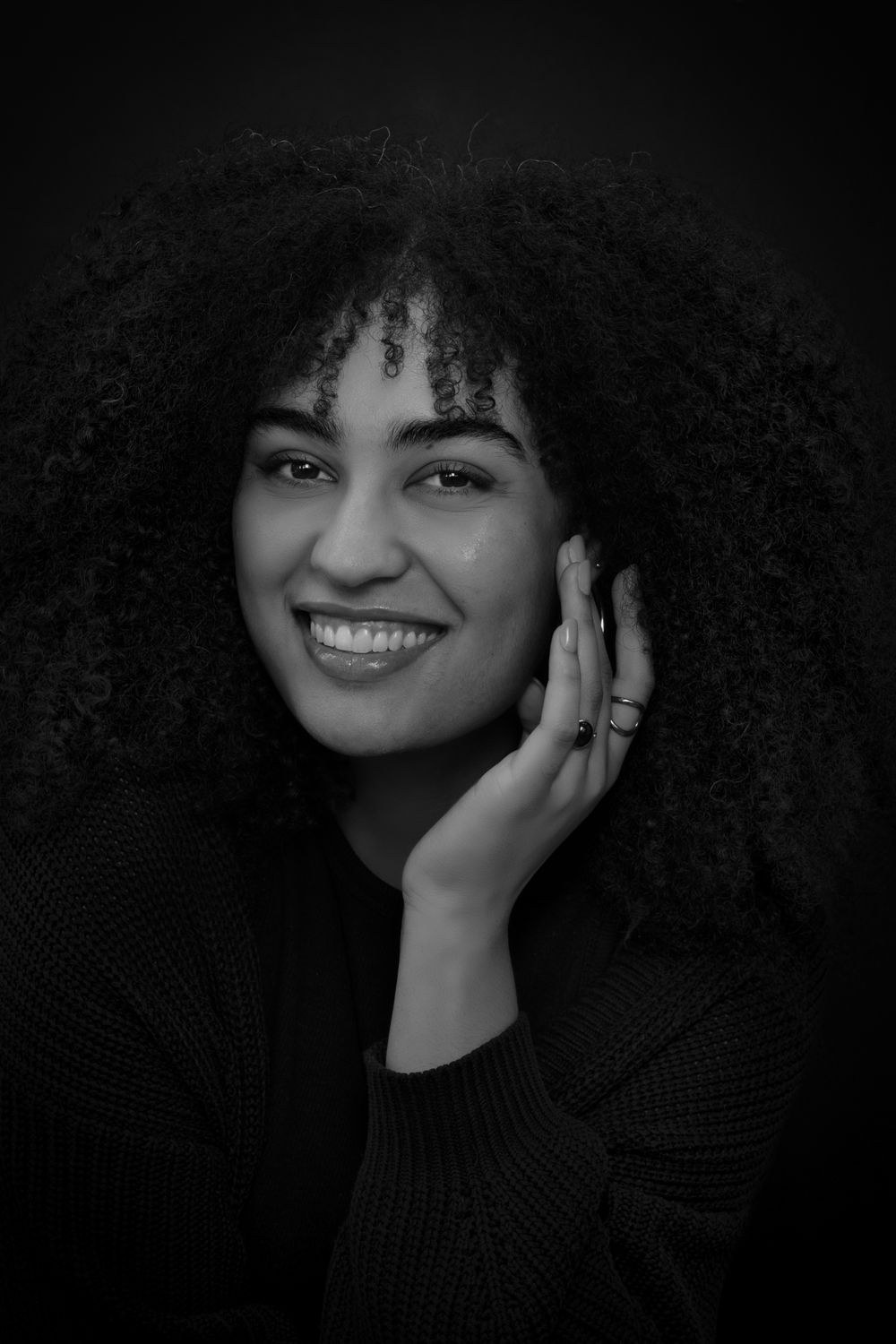 Black and white portrait of a smiling woman