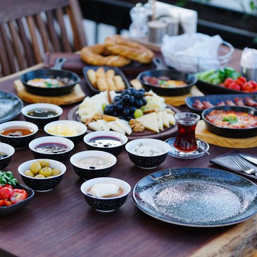 Free A vibrant outdoor spread showcasing a traditional Turkish breakfast with diverse dishes and beverages. Stock Photo