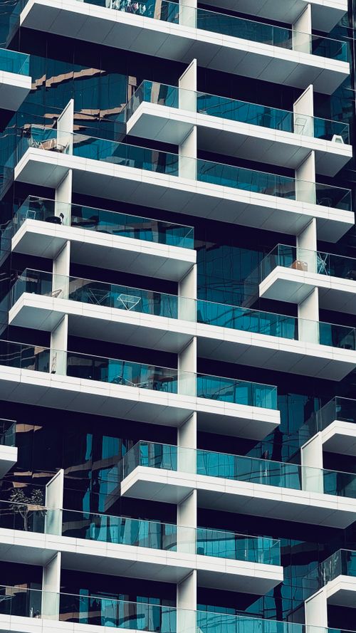 Free Close-up view of a residential building's geometric facade in Dubai, UAE, showcasing modern architecture. Stock Photo