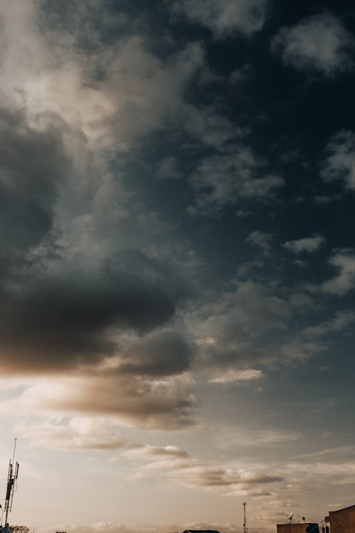 Cloudy sky over town at daytime