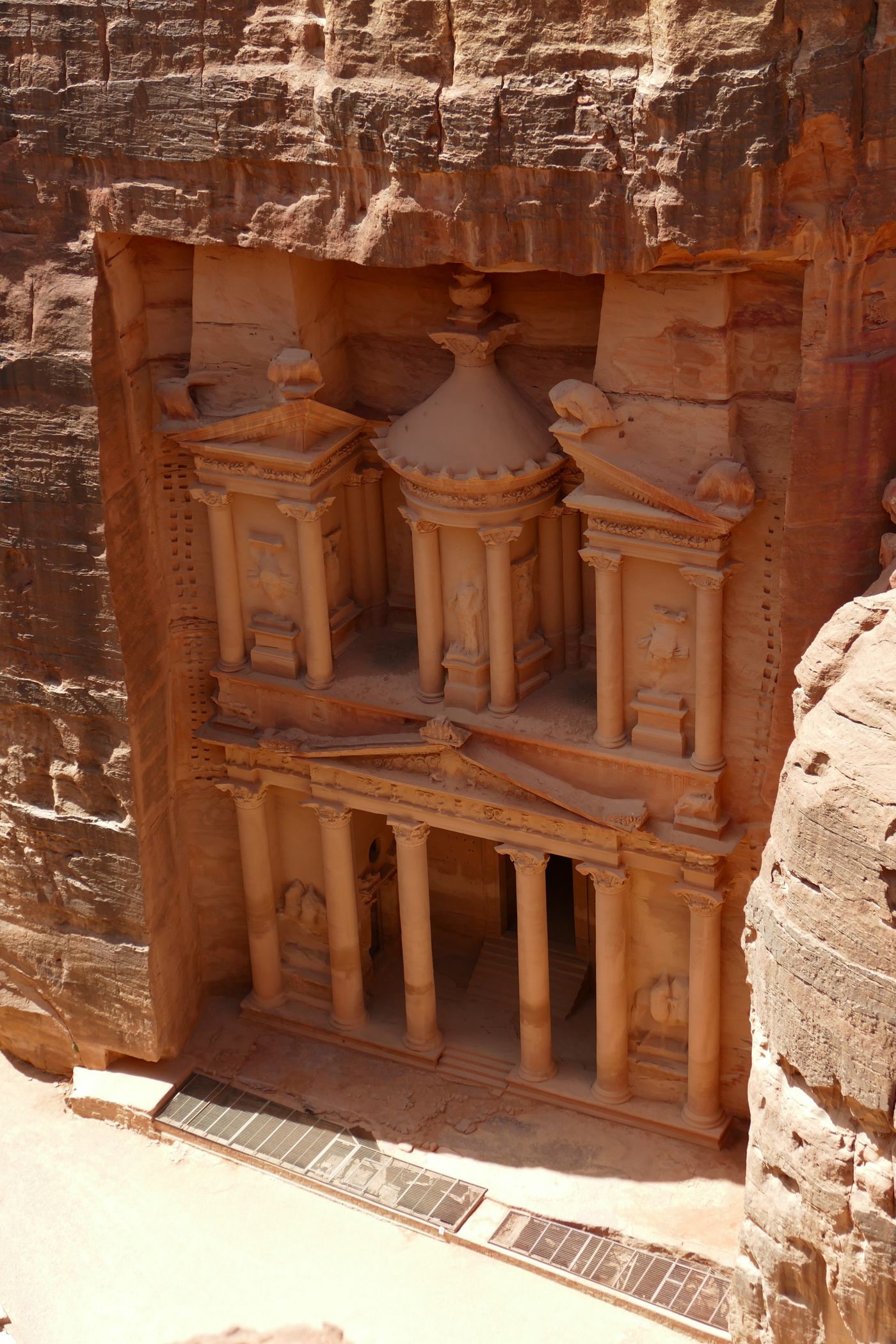 The Treasury at Petra, Jordan, carved into the rock face and lit by sunlight