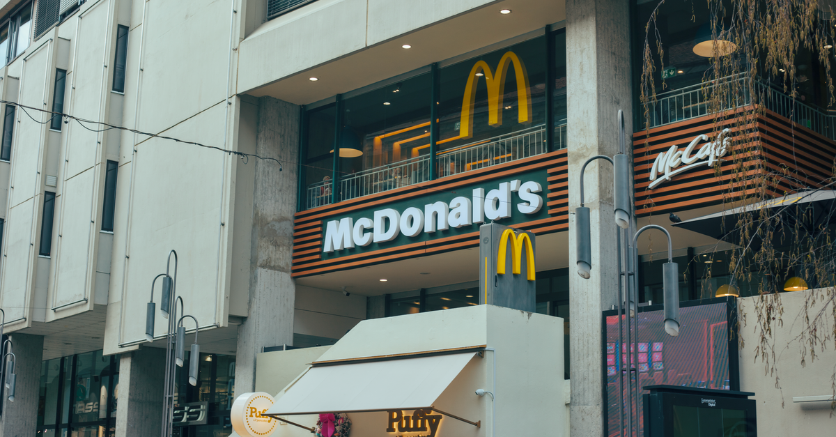 Street view of a modern McDonald's location in a busy urban area, Ljubljana, Slovenia.