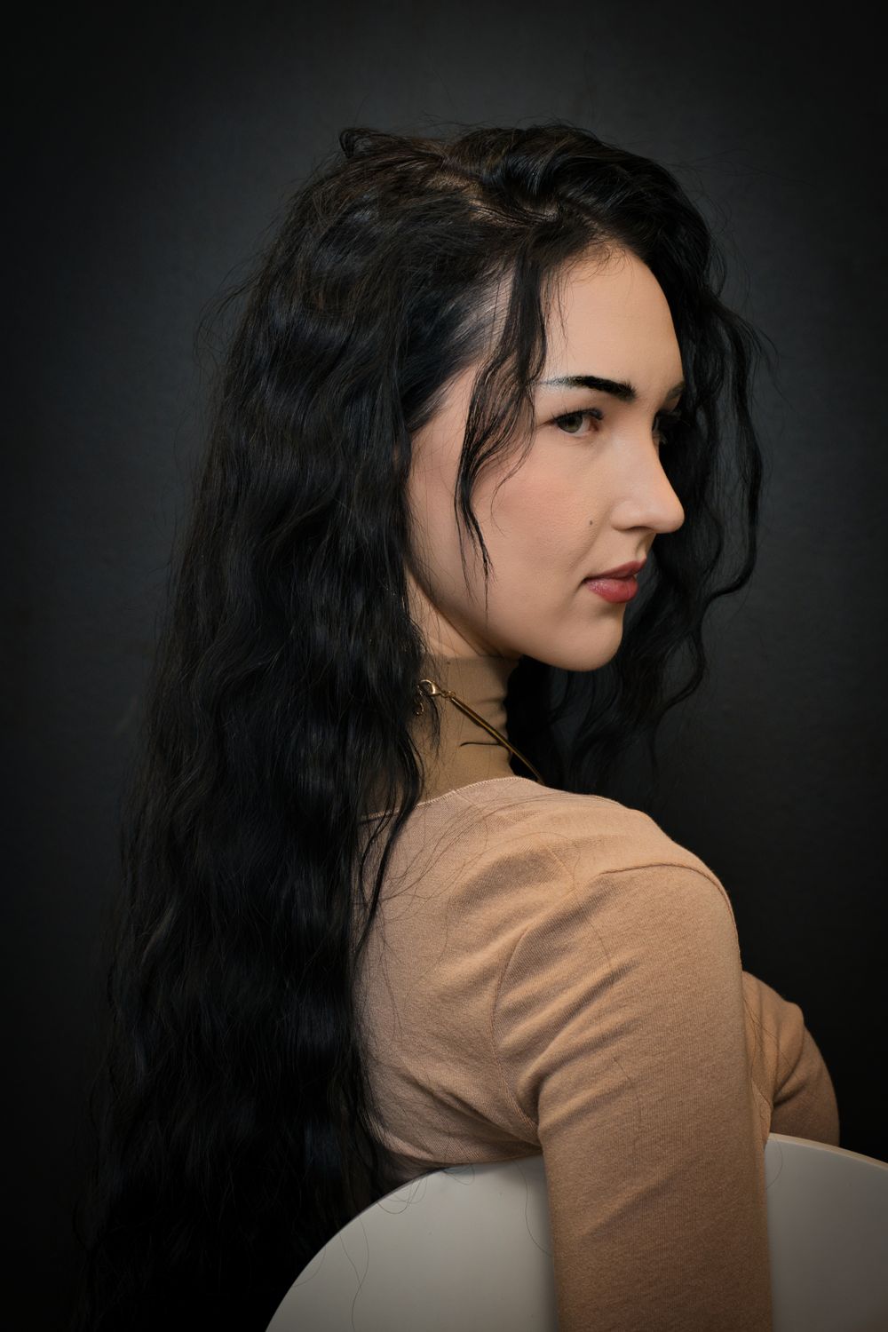 Elegant Portrait of Woman with Long Black Hair · Free Stock Photo