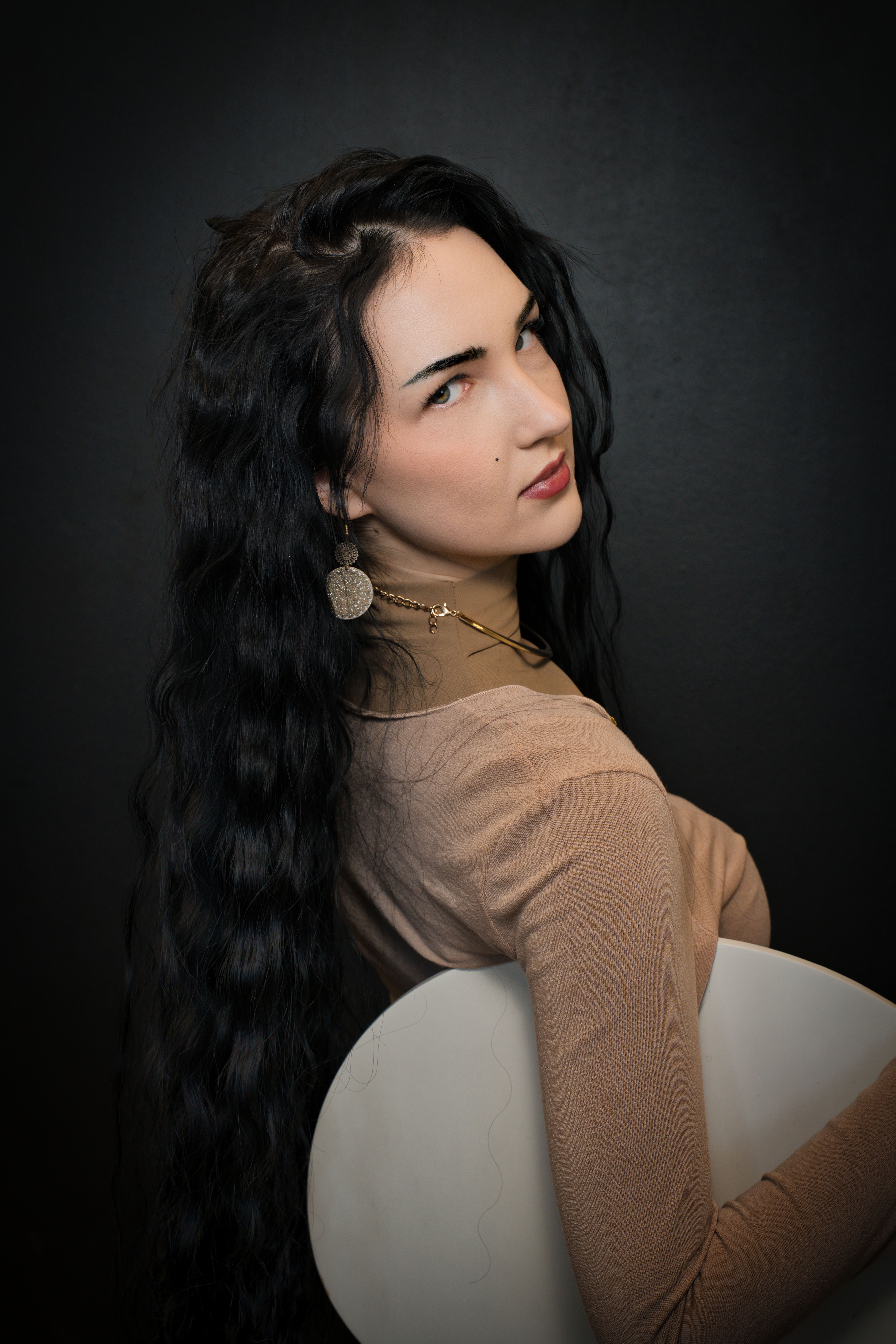 Elegant Portrait of Woman with Long Black Hair · Free Stock Photo