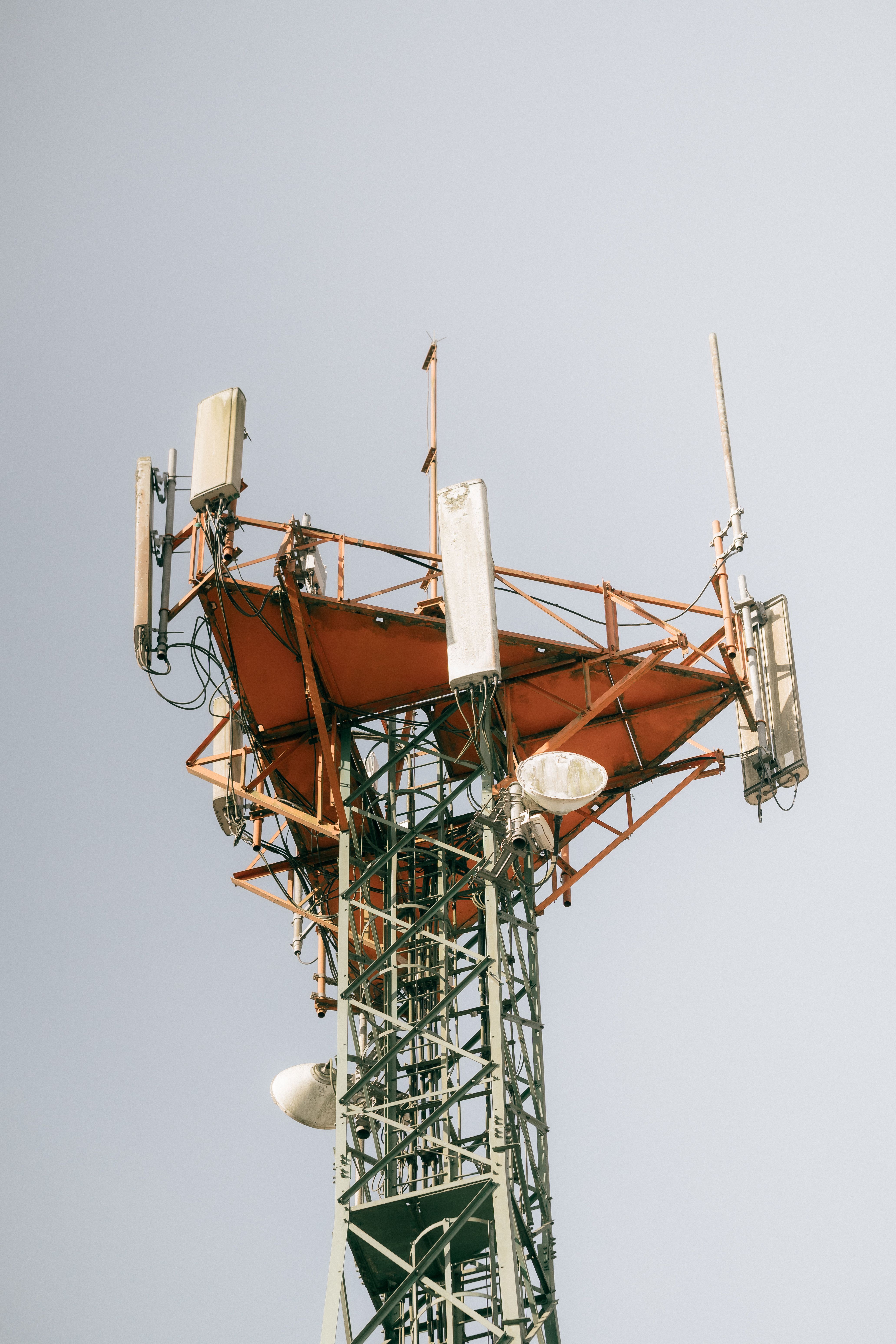 Close-up view of a telecommunication tower with antennas, highlighting connectivity and technology.