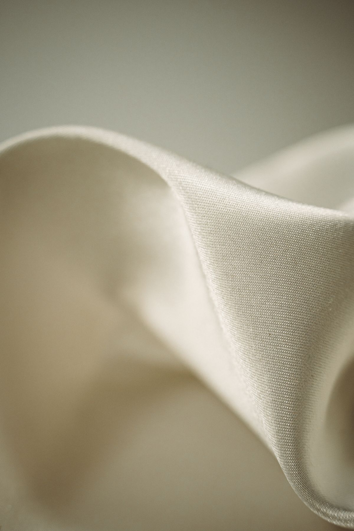 Close-up of smooth white silk fabric