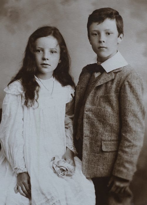 Free A Vintage Photo Of Lovely Siblings Stock Photo