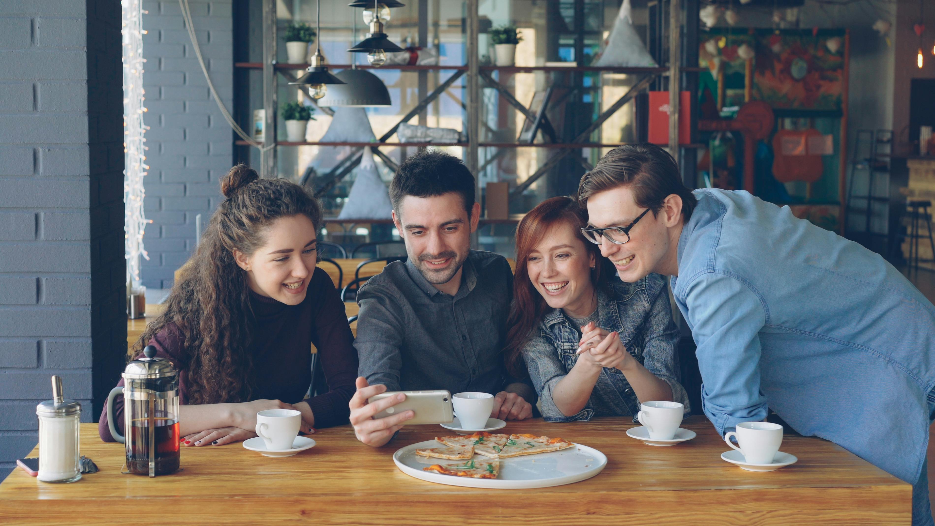 Young professionals socialising at networking event