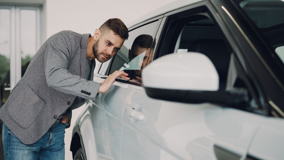 inspecting used car exterior panel gaps and paint inspecting used car exterior panel gaps and paint
