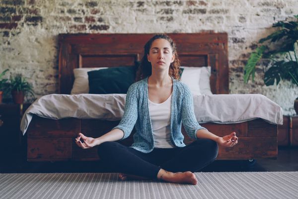 Woman meditating for stress relief