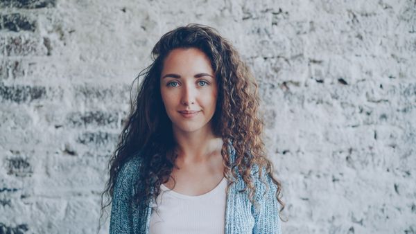 Sky blue cardigan over white tee