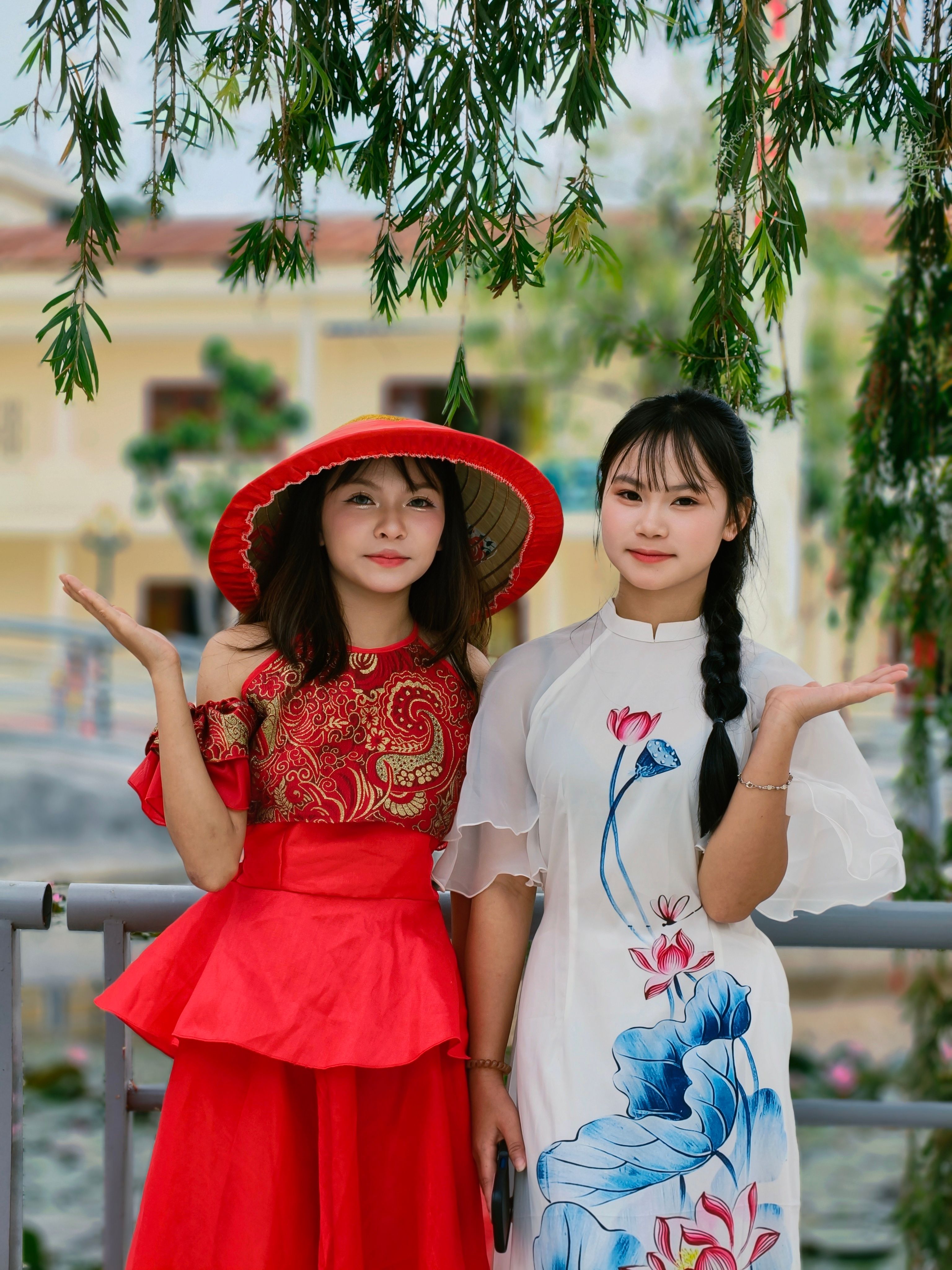 Two Women in Traditional Dresses Outdoors · Free Stock Photo