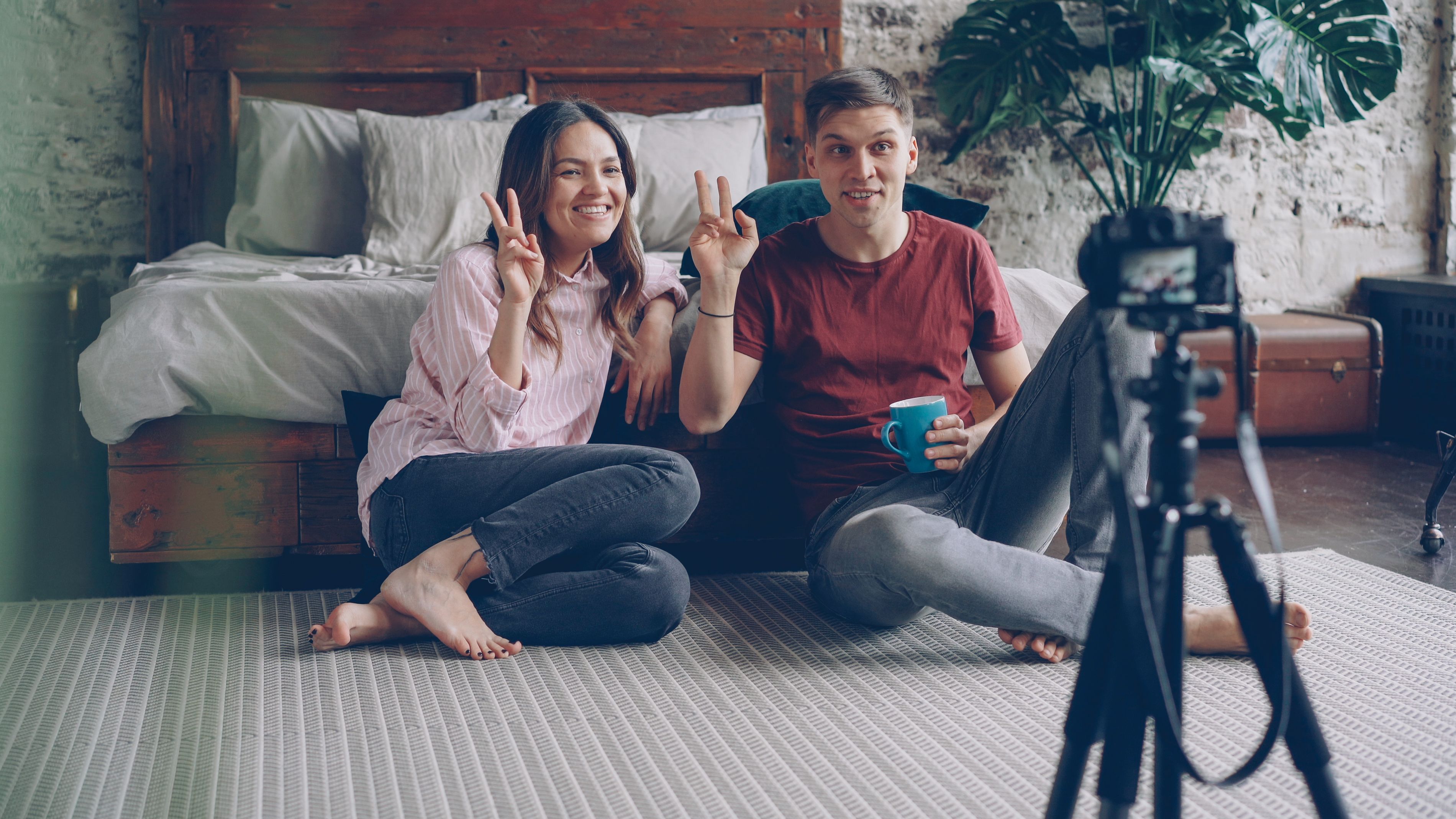 Smiling Couple Recording Vlog at Home Interior · Free Stock Photo