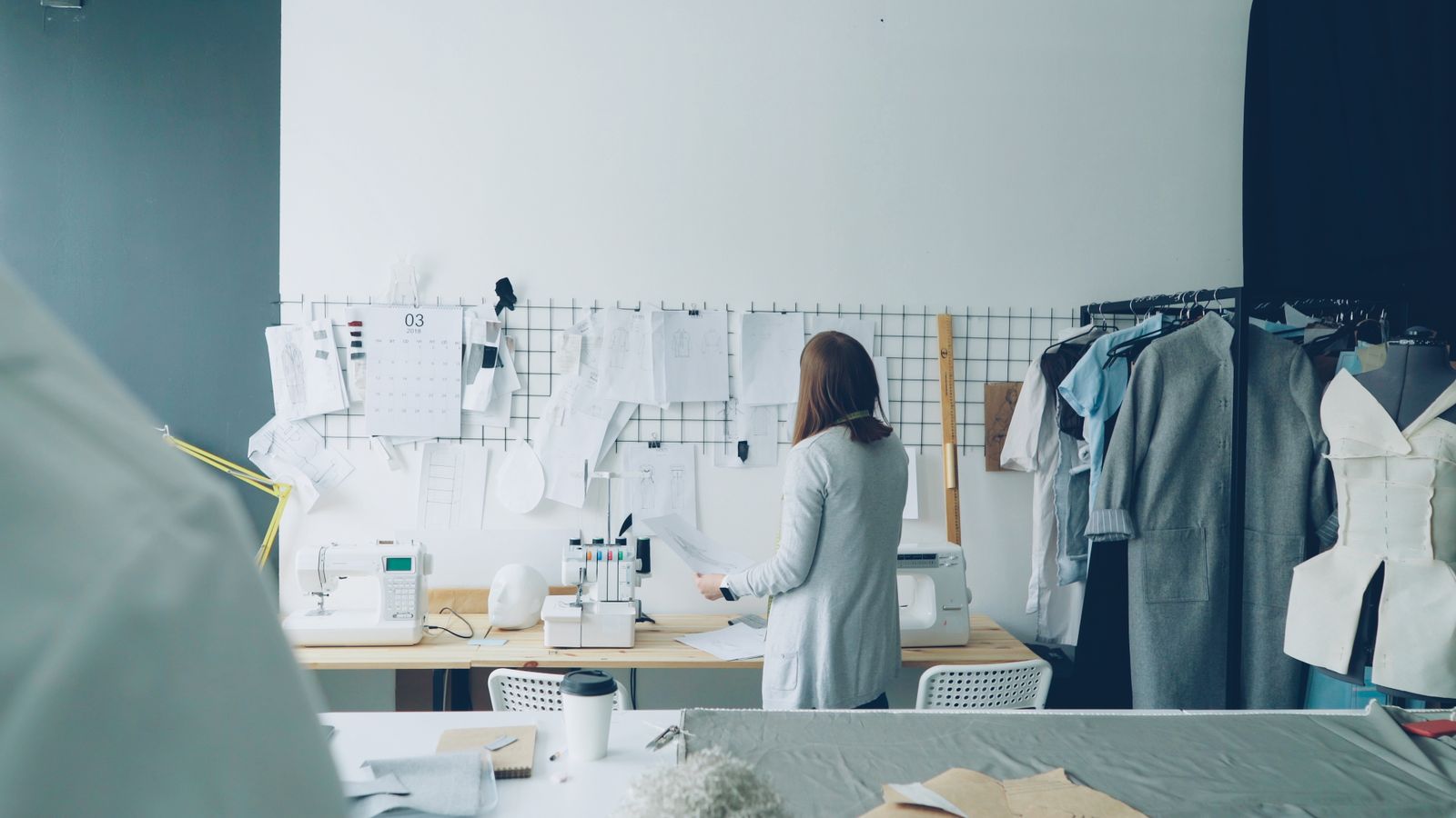 Fashion designer working in modern studio