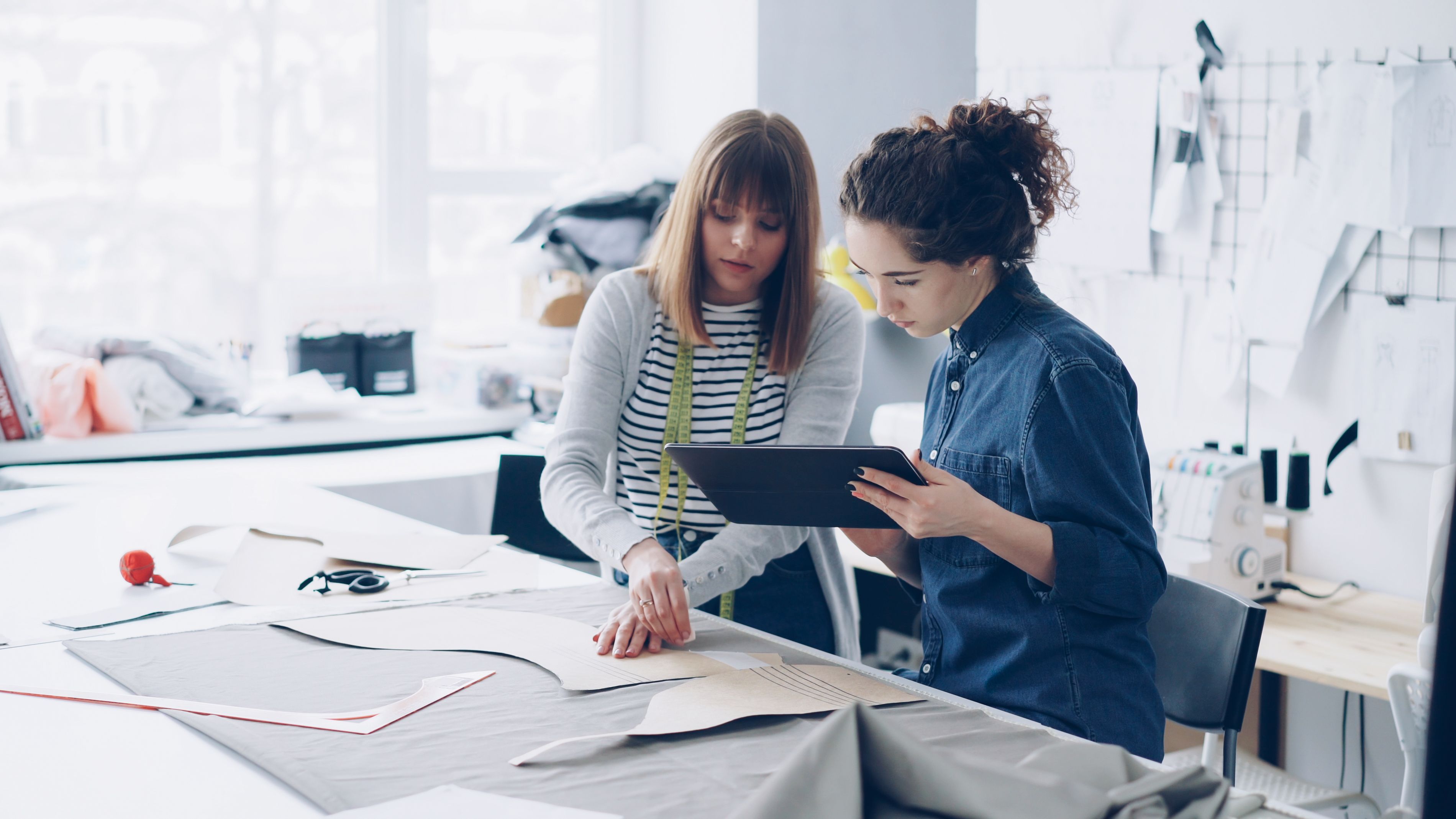 Fashion Designers Collaborating in Studio · Free Stock Photo