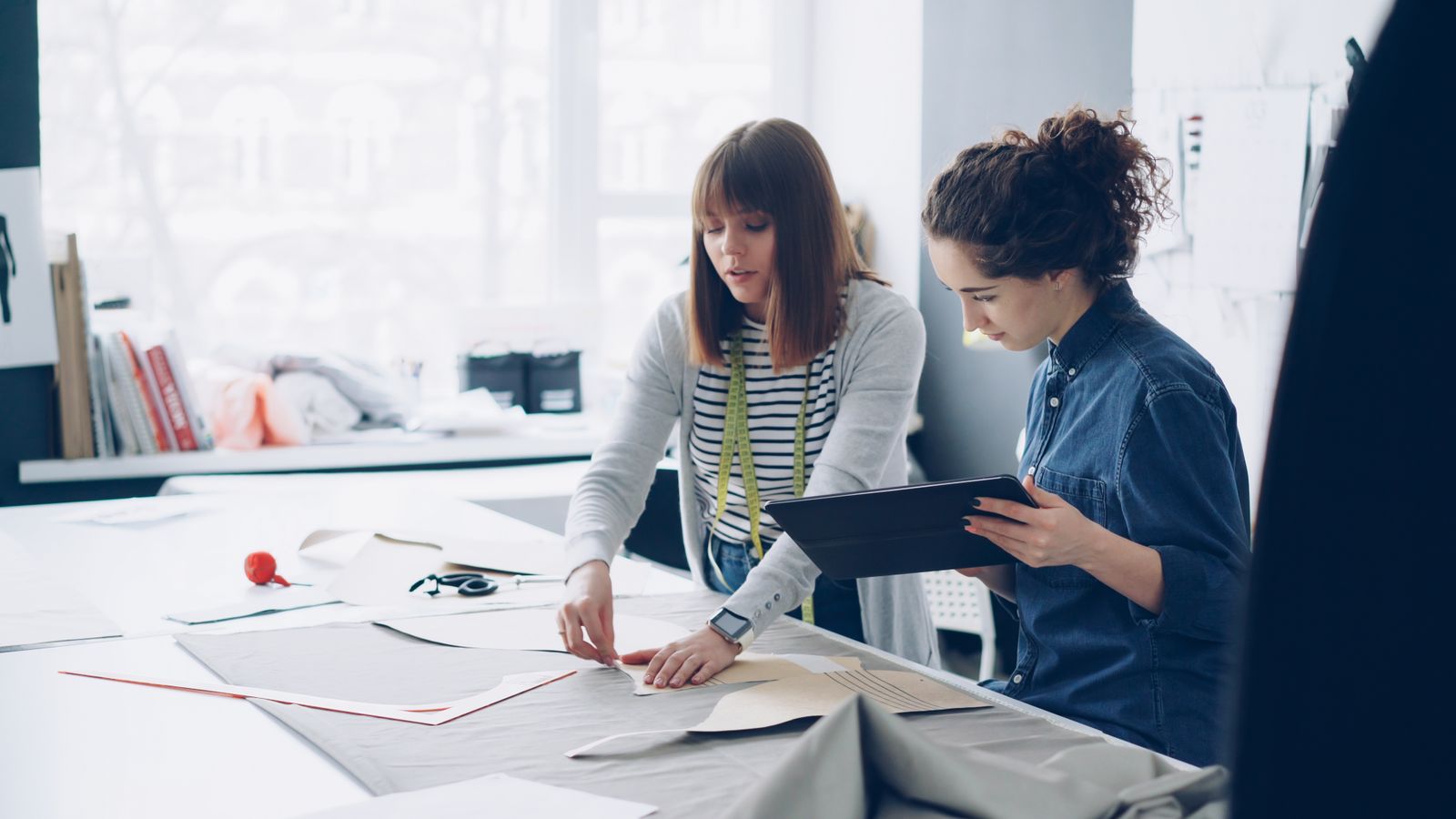 Designers reviewing an interface design together