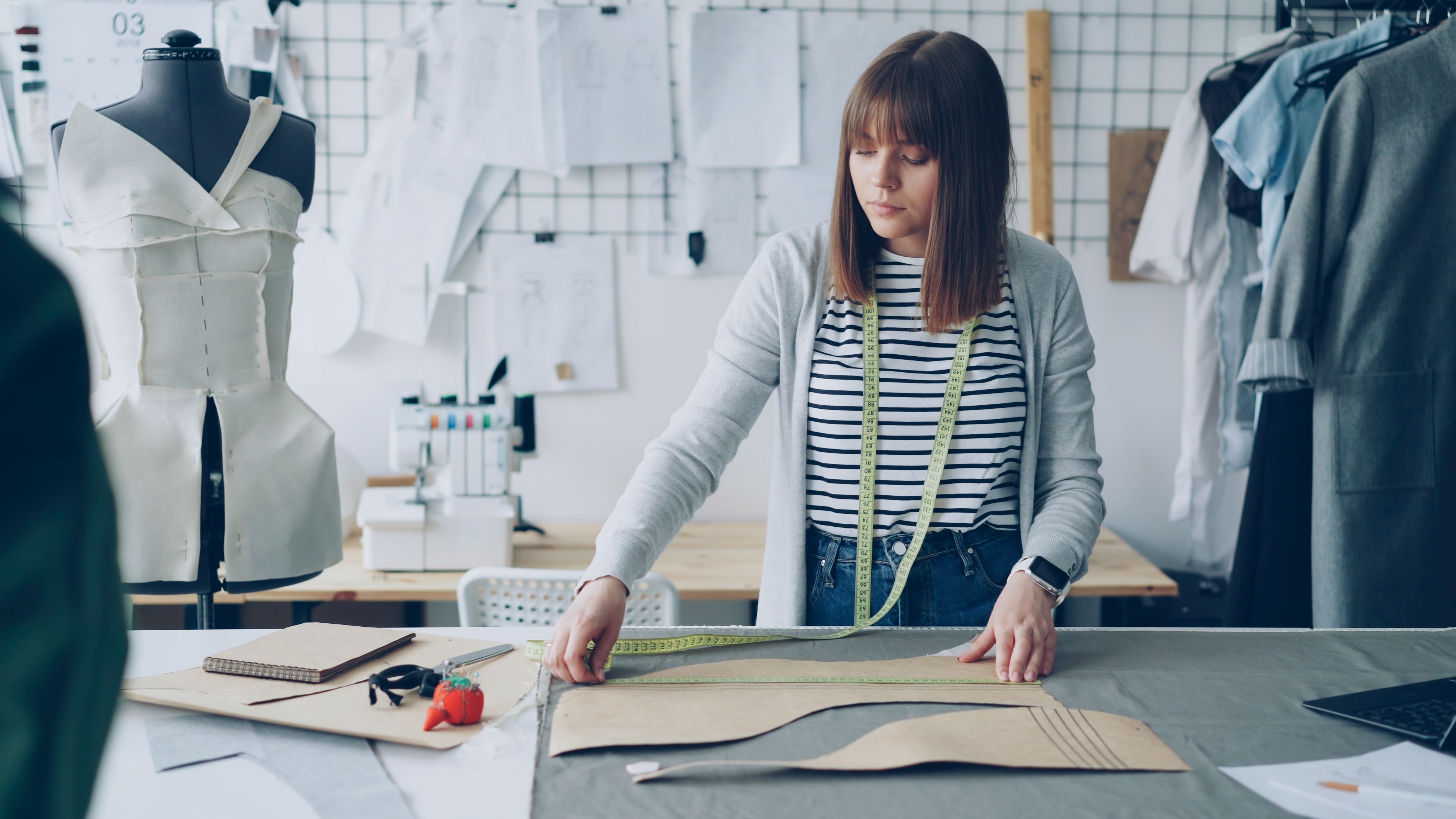 Illustrative photograph: Female Fashion Designer Working in Studio