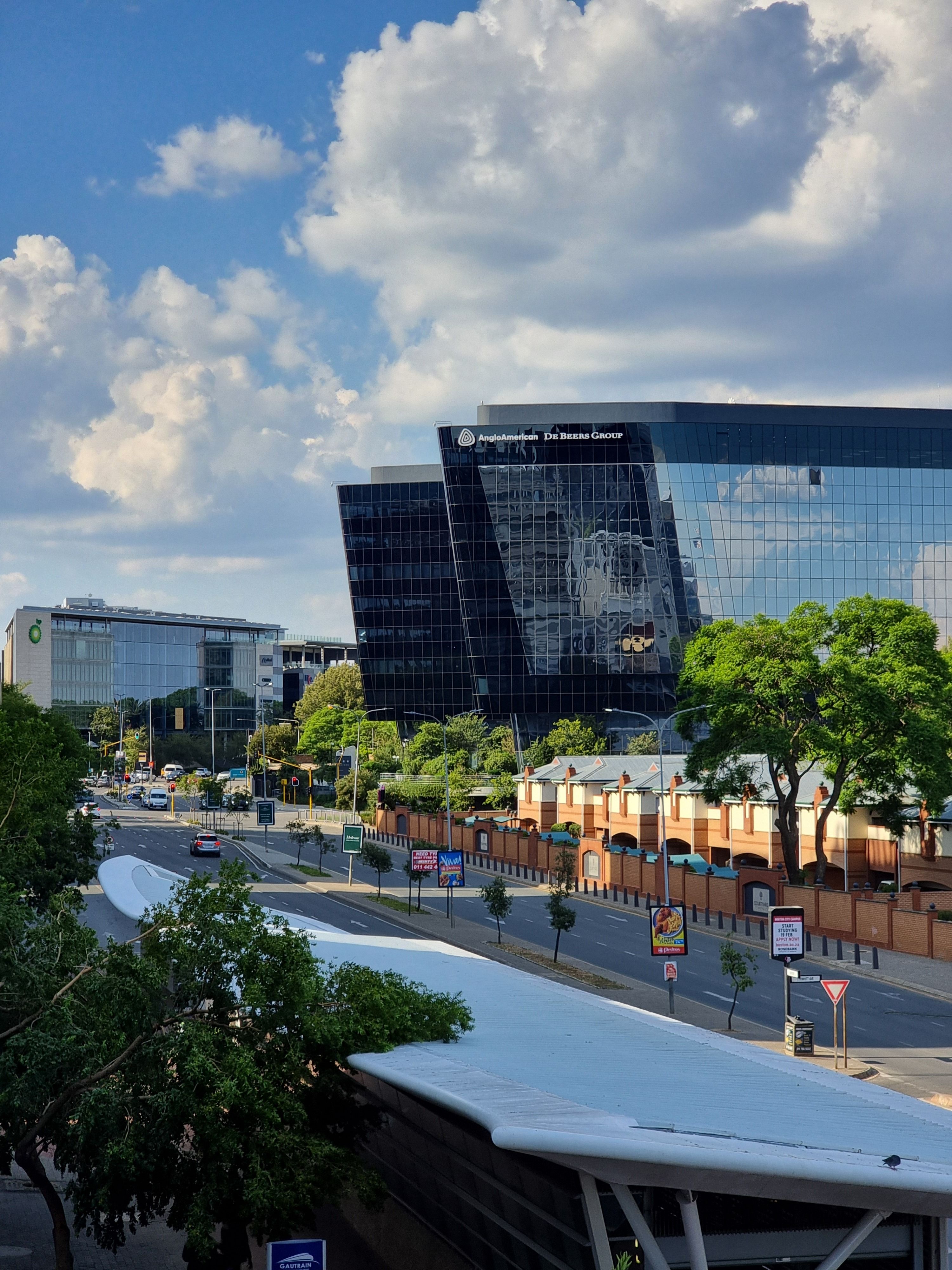 Skyline view of Sandton in Johannesburg, showcasing modern architecture and bustling streets.