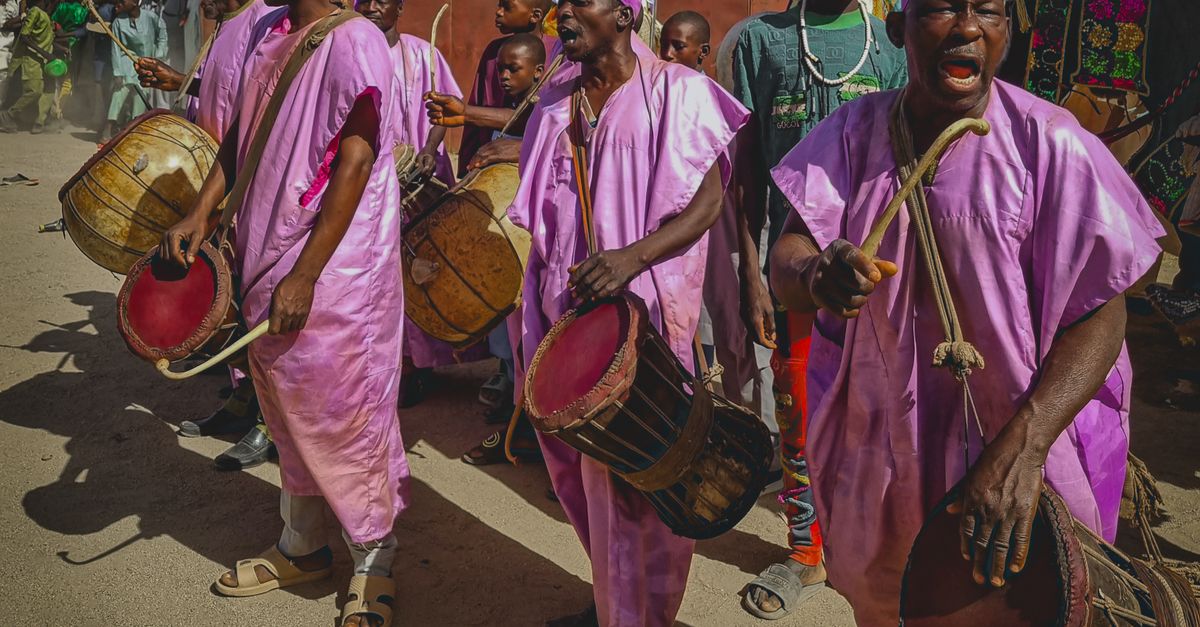 traditional Ewe drummers performing at a cultural festival in Volta Region