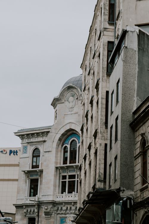 Free Capture of classic architectural buildings in Istanbul showcasing historic design in a bustling urban environment. Stock Photo