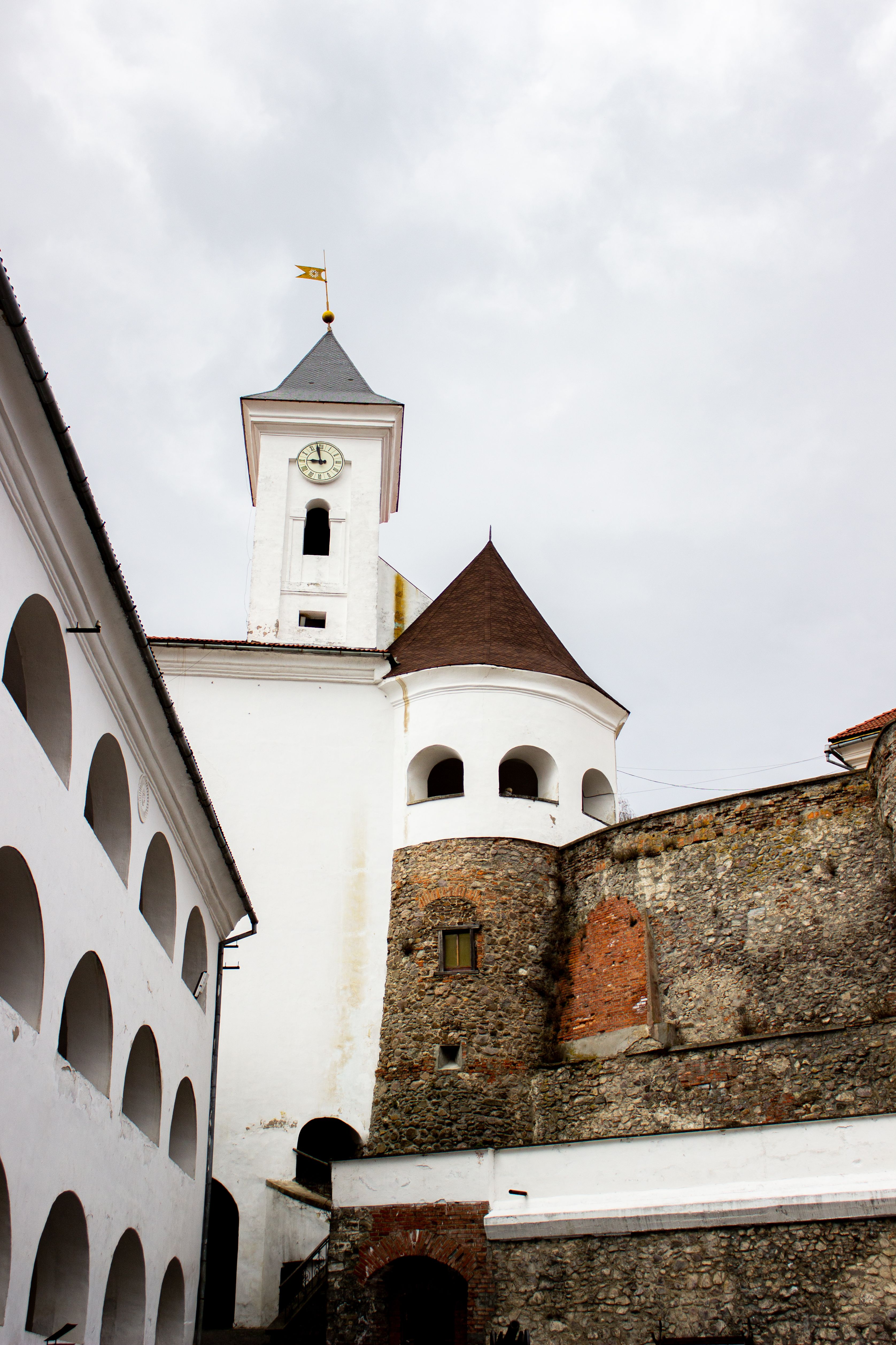 Historic Castle Tower Against Cloudy Sky · Free Stock Photo