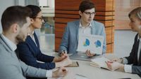 Colleague announcing a new role, photo by Vitaly Gariev on Pexels