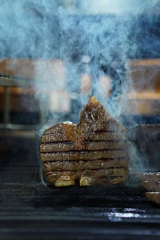 Beef, short loin, t-bone steak, bone-in, separable lean only, trimmed to 1/8" fat, choice, cooked, grilled