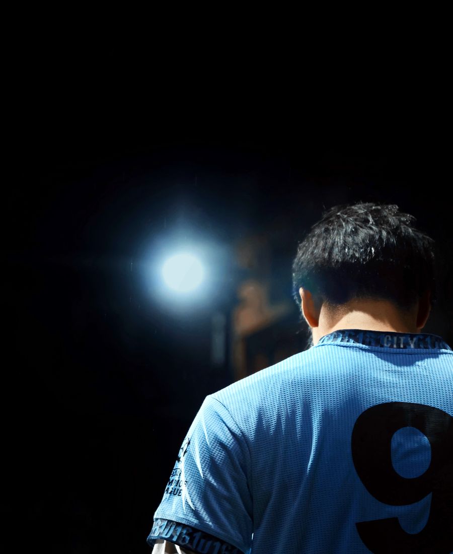 Athlete under stadium spotlight