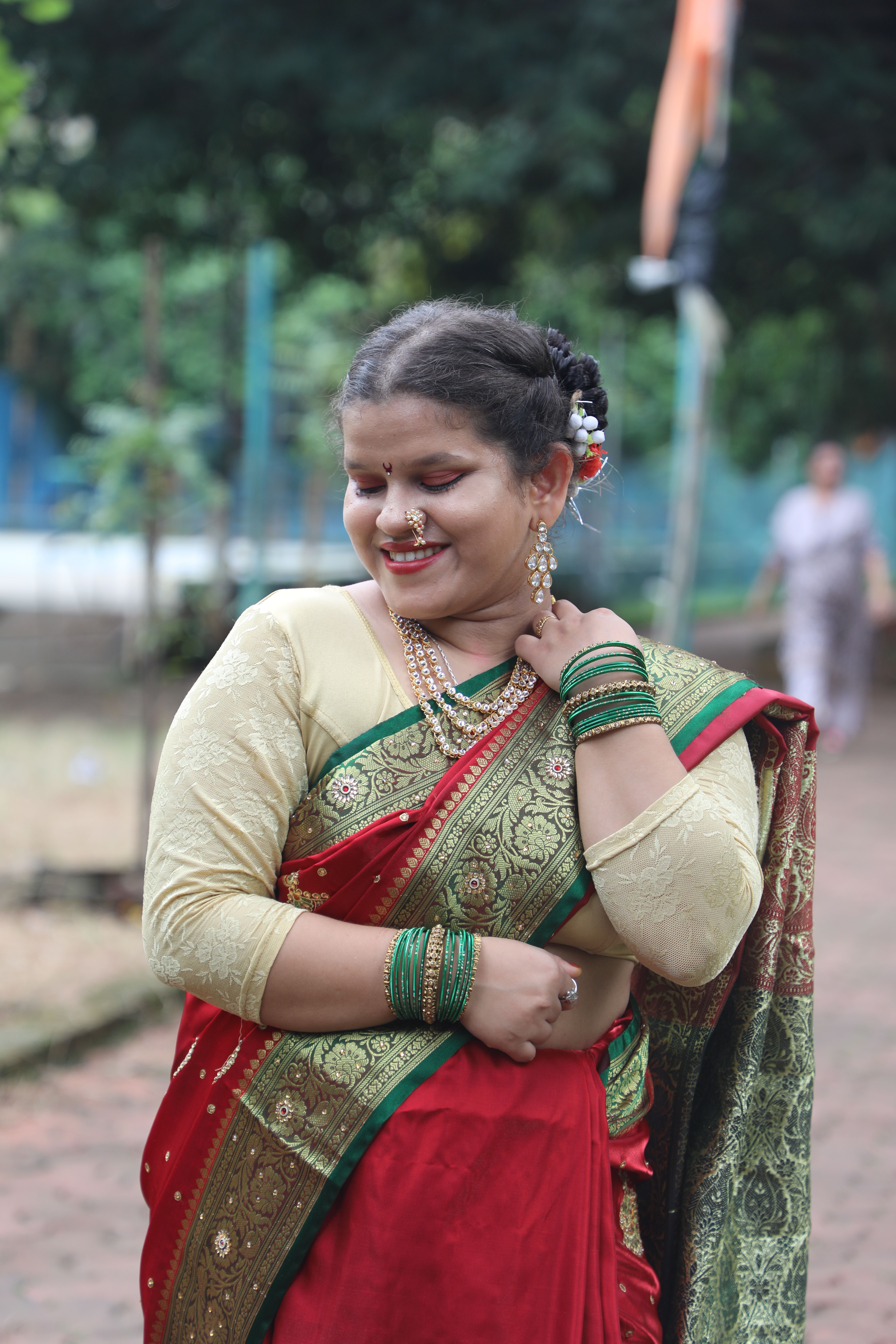 Elegant Woman in Traditional Indian Saree Outdoors · Free Stock Photo