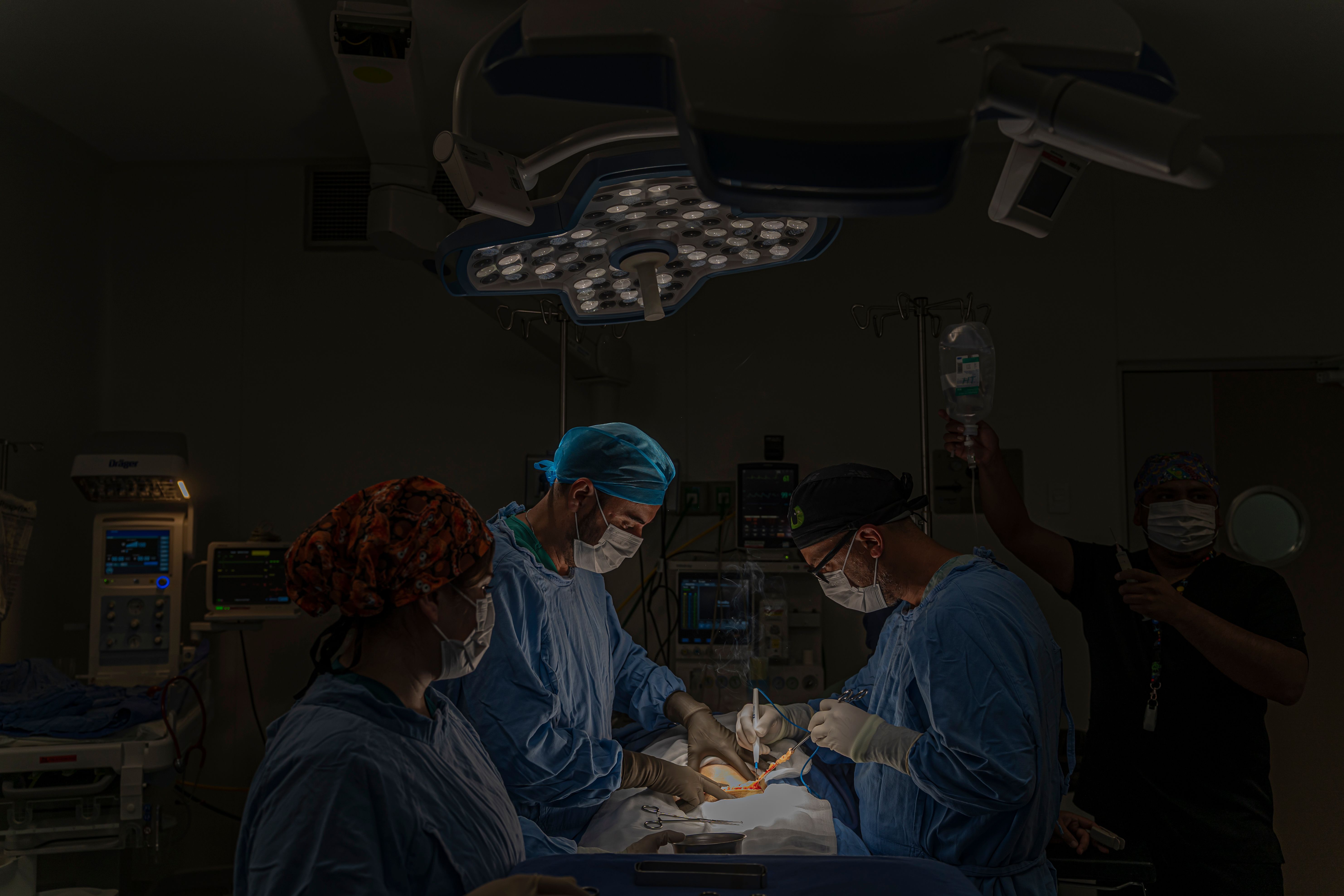 Surgical Team Performing Operation in Operating Room · Free Stock Photo