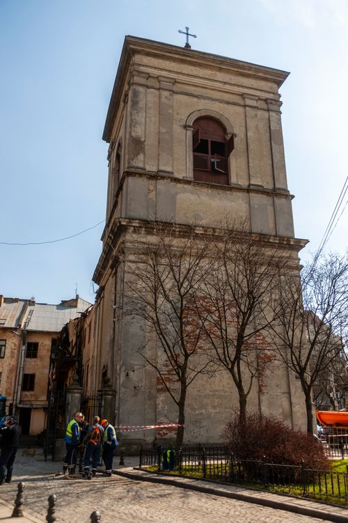 Free Lviv's historic bell tower, a striking example of traditional architecture, captured in the heart of the city. Stock Photo