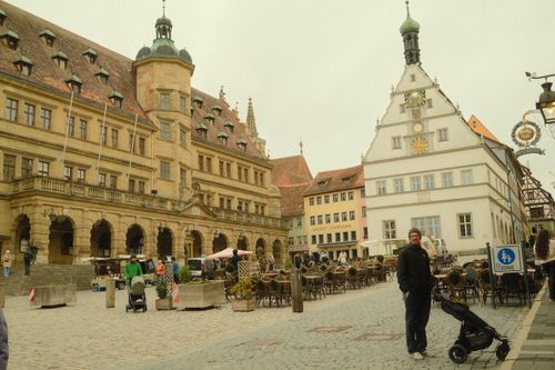 Free Charming medieval town square in Rothenburg ob der Tauber, showcasing iconic architecture and vibrant street life. Stock Photo