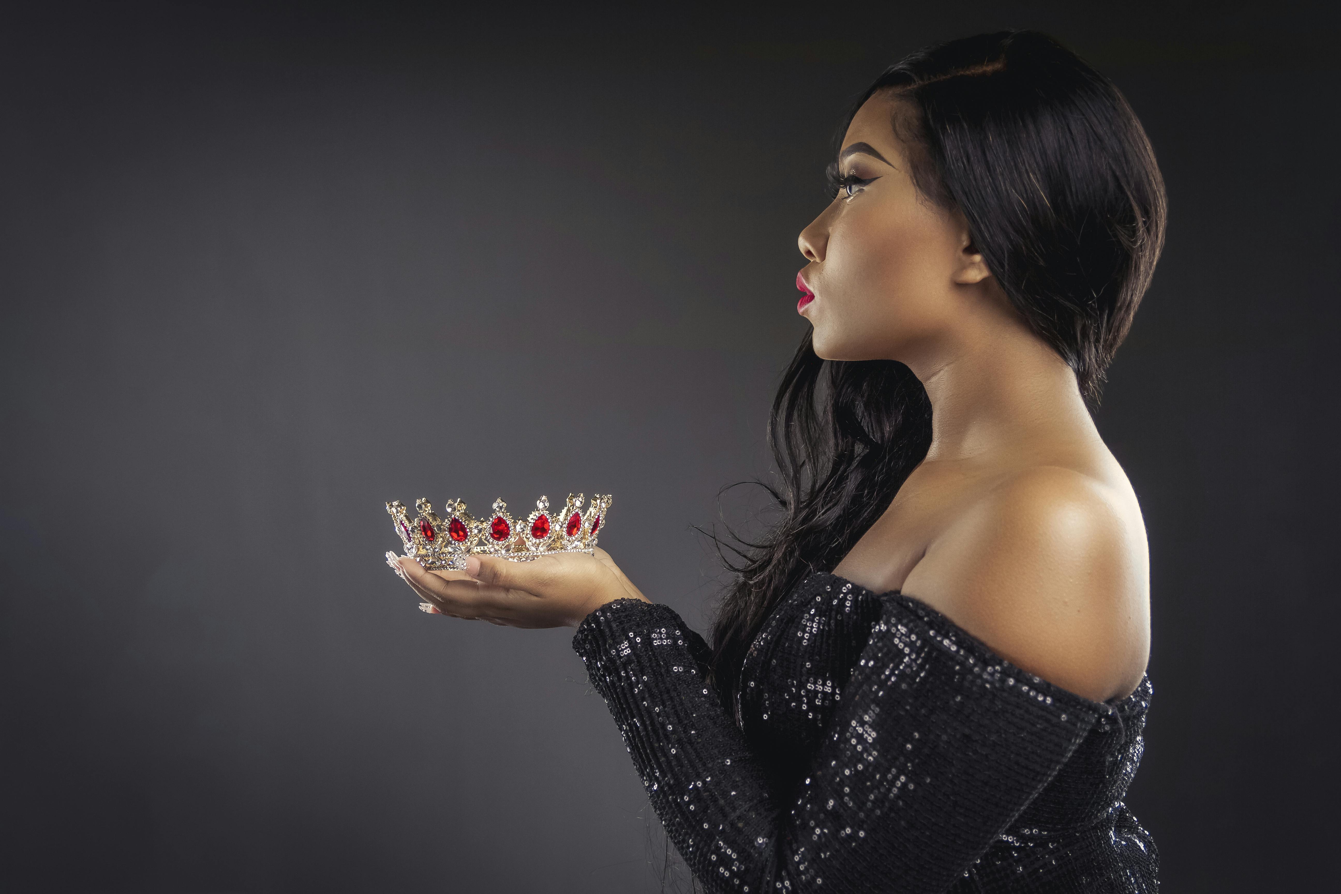 Photo Of Woman Holding Crown · Free Stock Photo