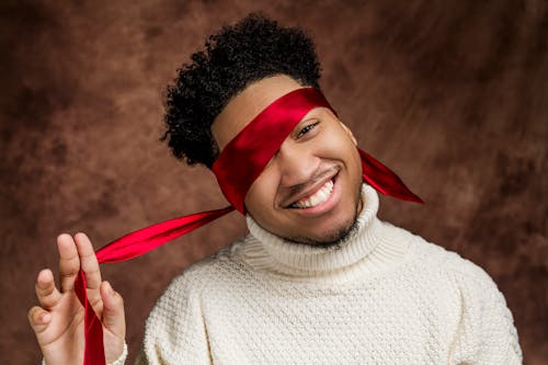 Photo Of Man Wearing White Sweater 