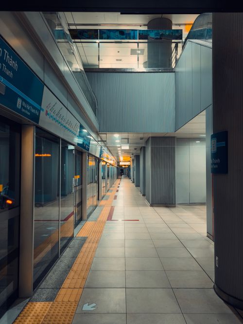 Free Clean, empty underground station with modern architectural design and bright lighting. Stock Photo