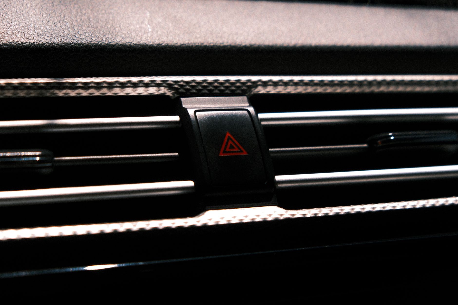 Check engine light on a dashboard
