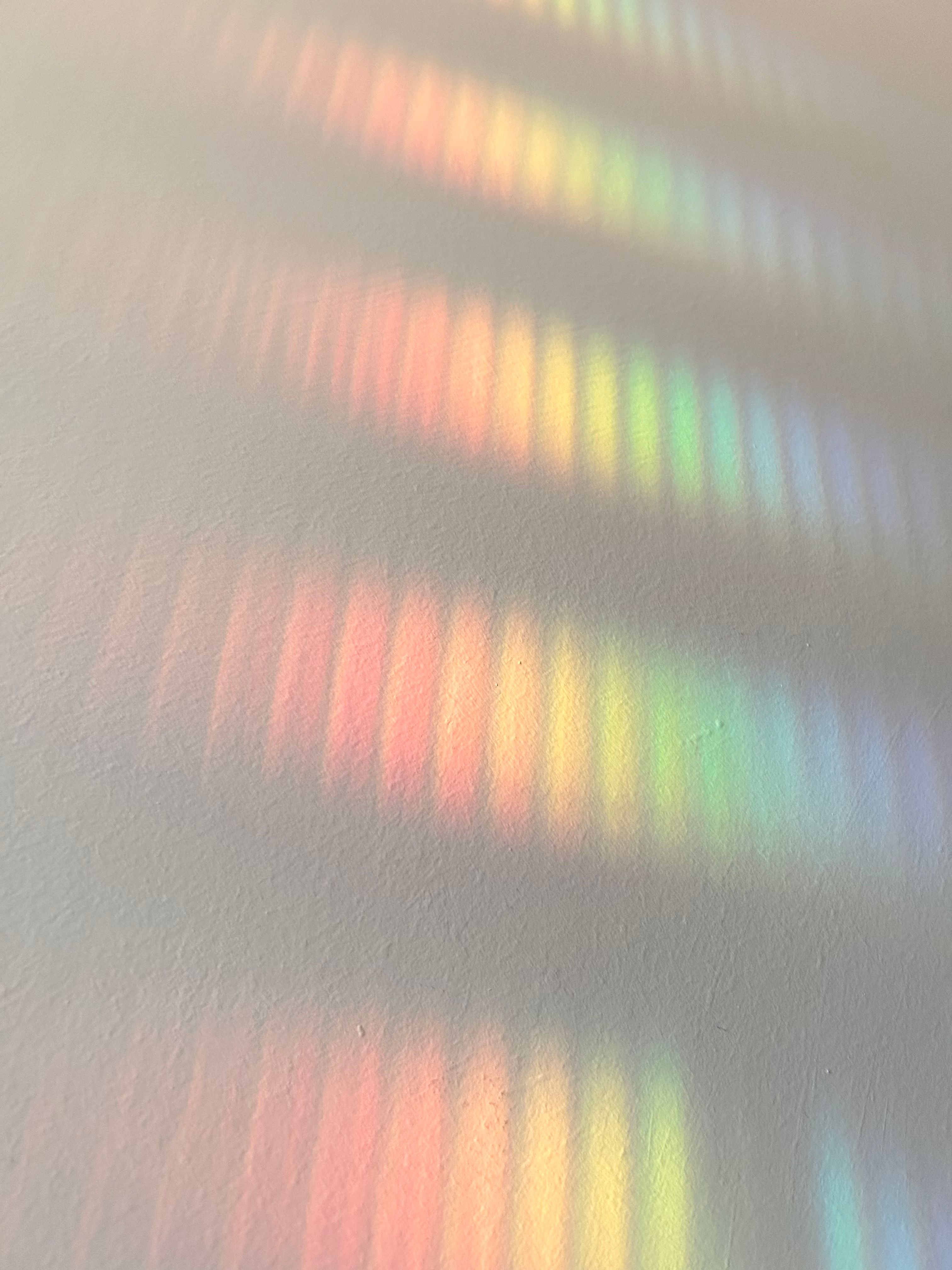 Abstract Rainbow Light Reflections on Wall · Free Stock Photo