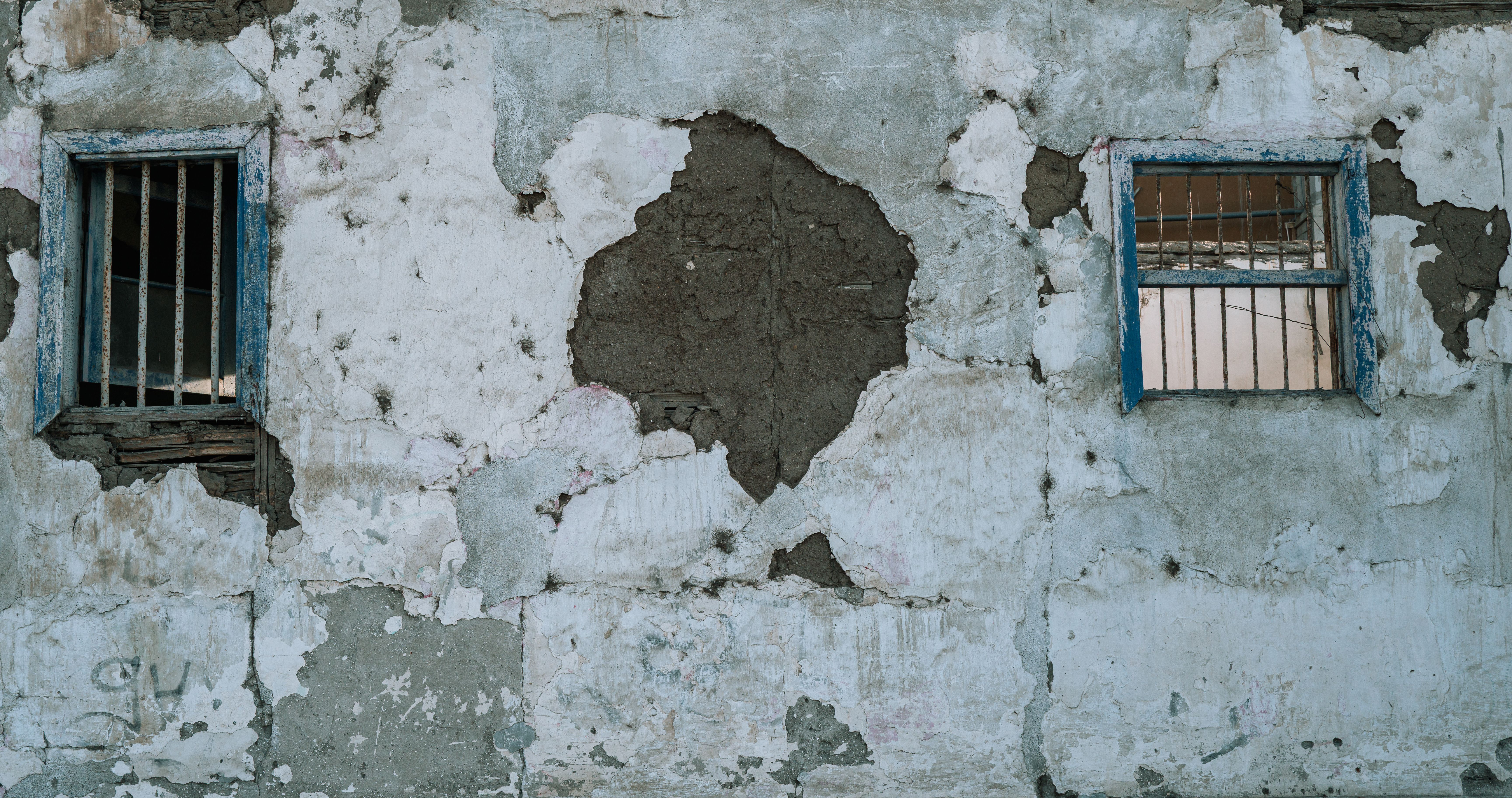 Masonry and Render Painting in Clapham Junction — careful masking before painting begins