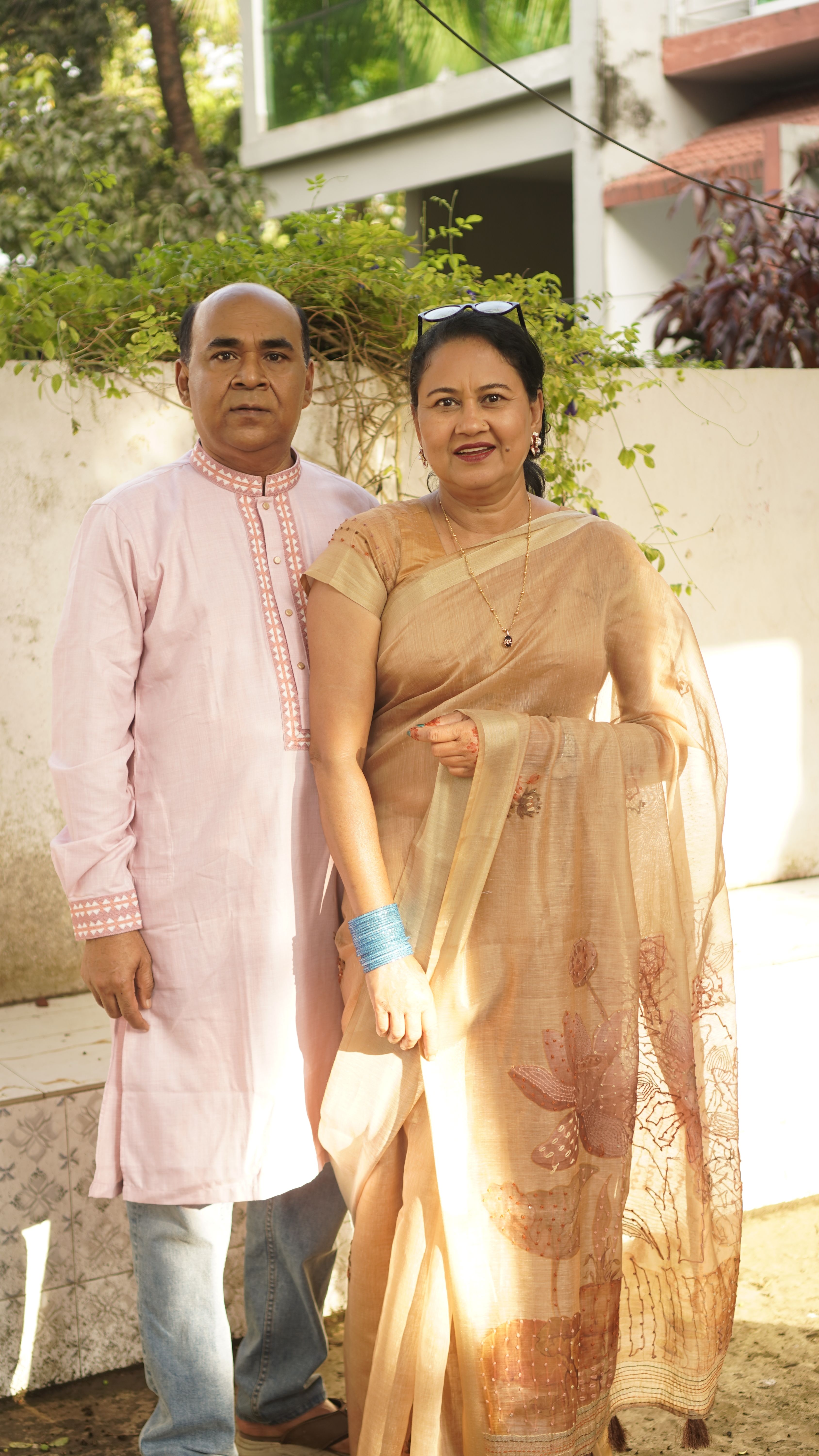 Couple in Traditional Attire Outdoors · Free Stock Photo