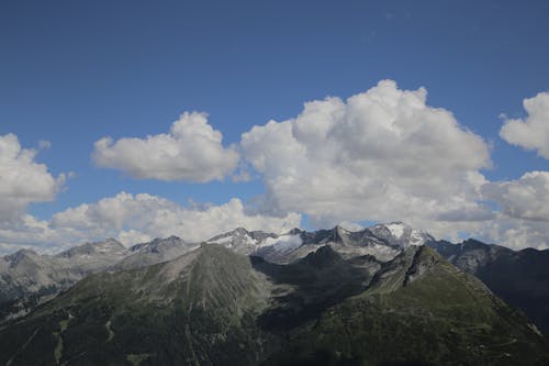 Бесплатное стоковое фото с горный хребет, горы, заснеженные горы