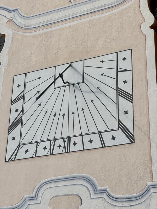 Free A detailed sundial with Roman numerals on a historic building wall in Bavaria, Germany. Stock Photo