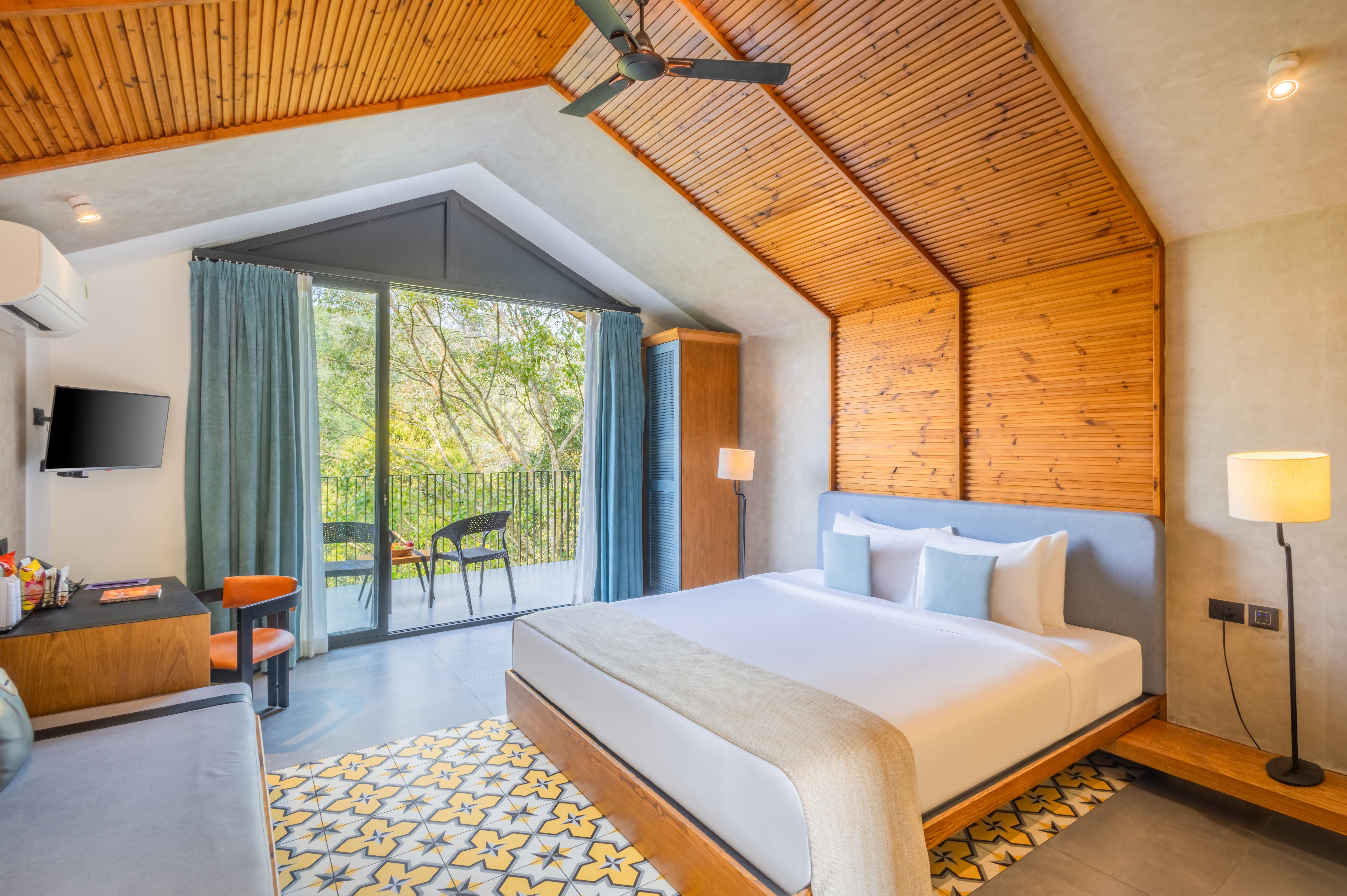Primary suite bedroom with sea view at Villa Auberon