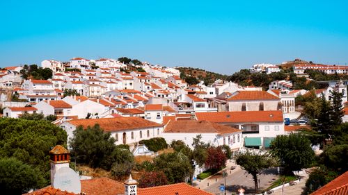 Free Charming view of Odemira, Portugal with iconic white buildings and red roofs on a sunny summer day. Stock Photo