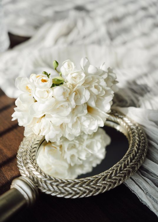 White Roses Reflected Elegant White Roses on Vintage Mirror Reflection · Free Stock Photo